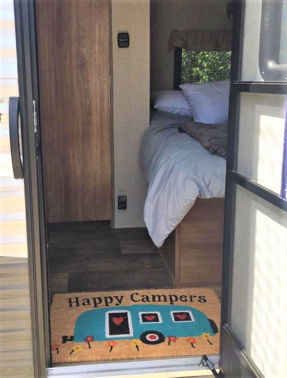 Comfy bedding in our camper